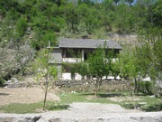 5000 sq.m. land with cottage,  boundary,  orchard,  retaining walls,  park